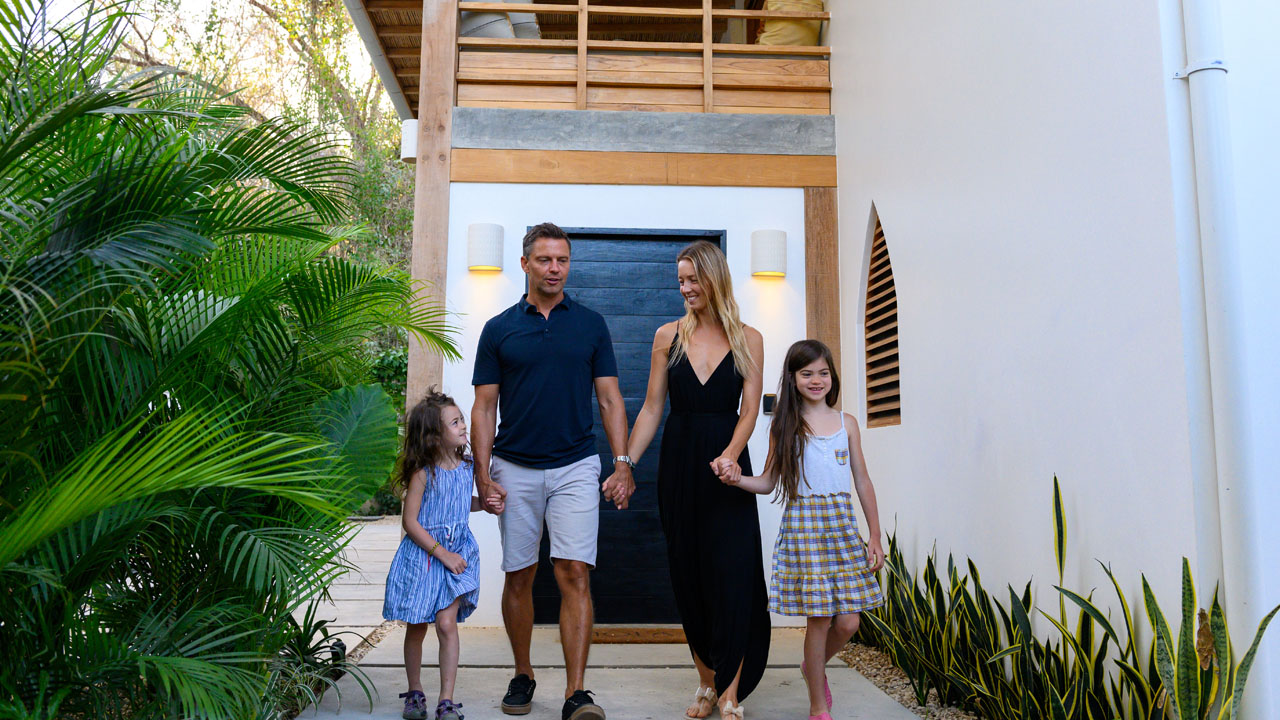 family walking out their house