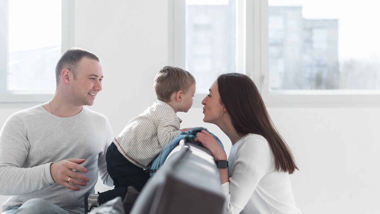 Happy parents home with baby
